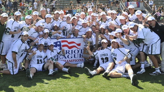 The lacrosse team together for a picture after the patriot league championship win.